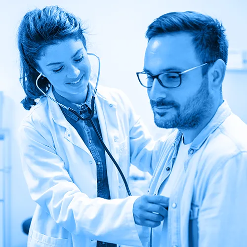 A person receiving a check-up to monitor their hypertension