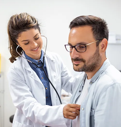 A person receiving a check-up to monitor their hypertension